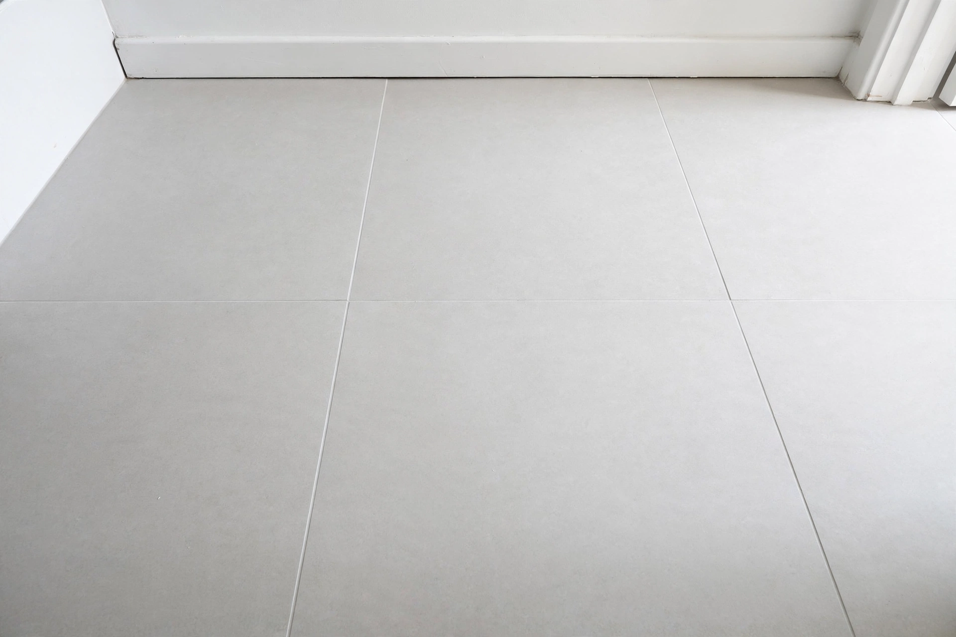 Large-format floor tiles — small bathroom idea